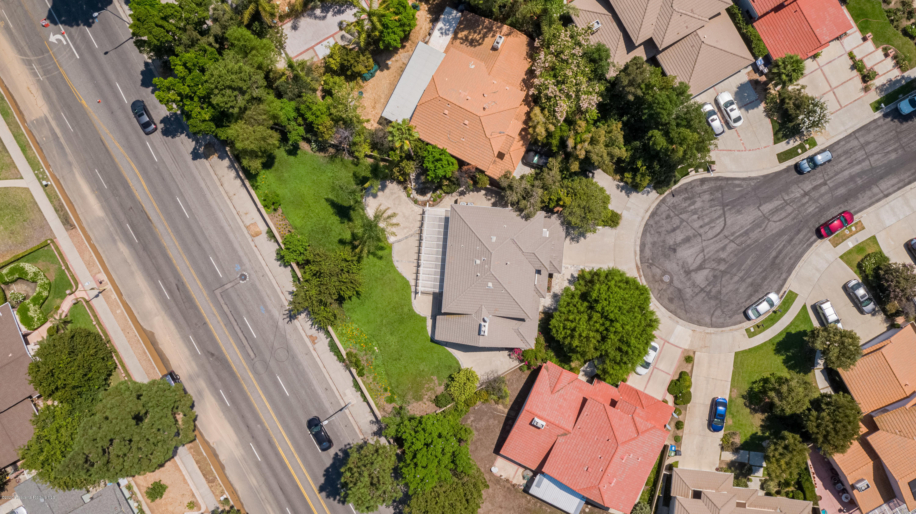 10652 Rathburn Avenue Porter Ranch, CA 91326 - Photo 49 of 61 an aerial view of a house with a yard and a garden