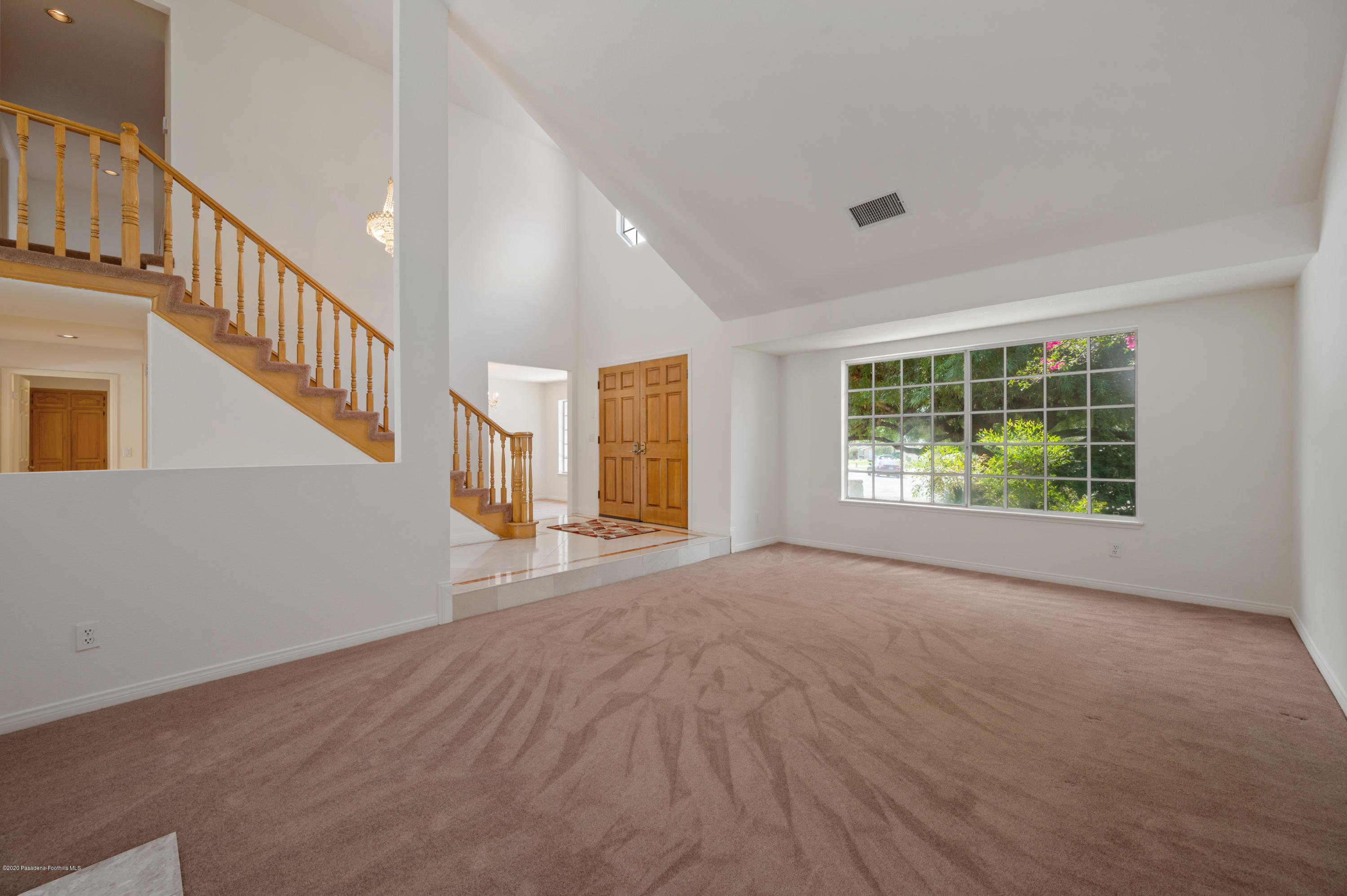 10652 Rathburn Avenue Porter Ranch, CA 91326 - Photo 6 of 61 a view of an empty room with a window