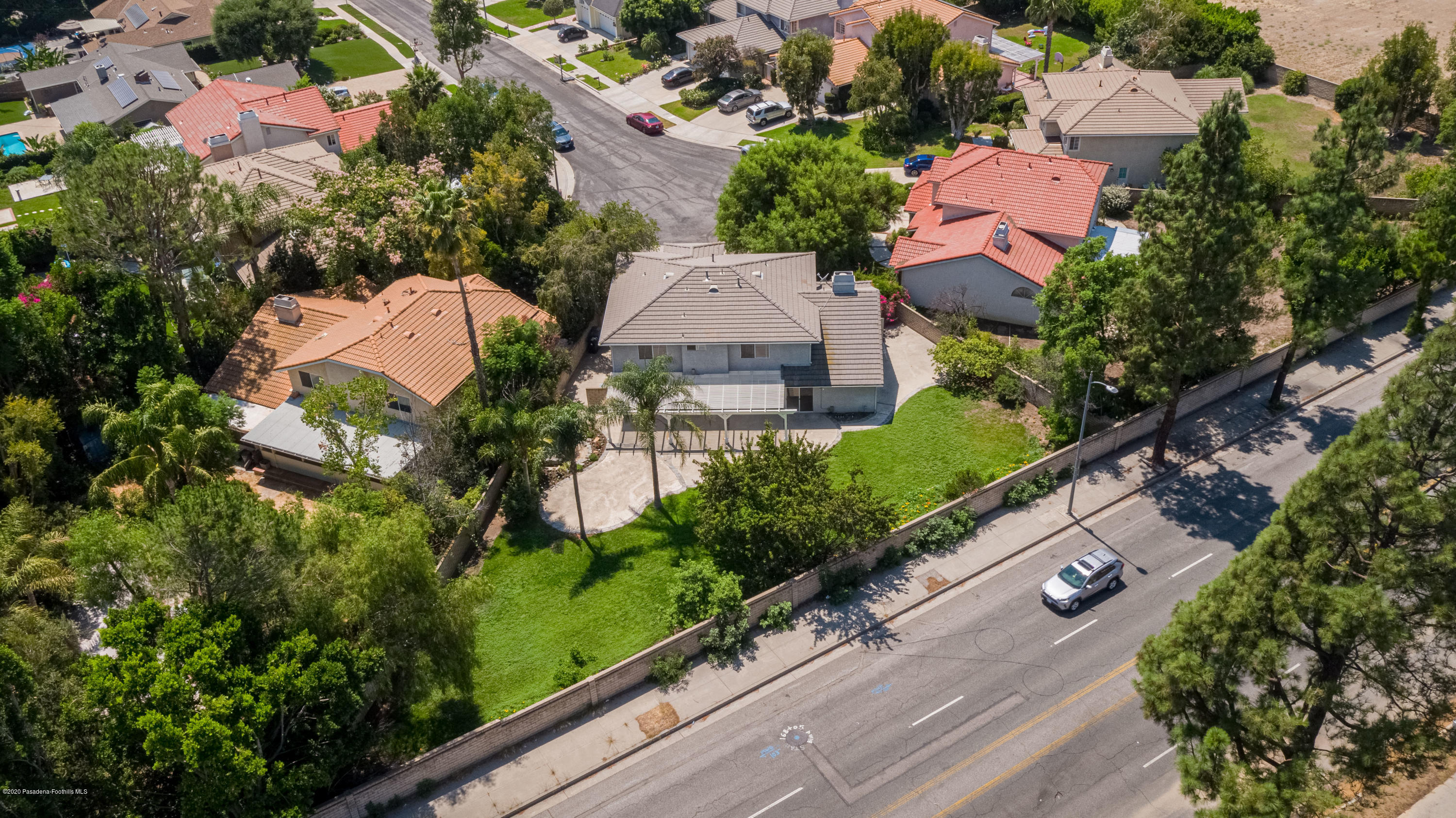10652 Rathburn Avenue Porter Ranch, CA 91326 - Photo 60 of 61 an aerial view of multiple houses with yard
