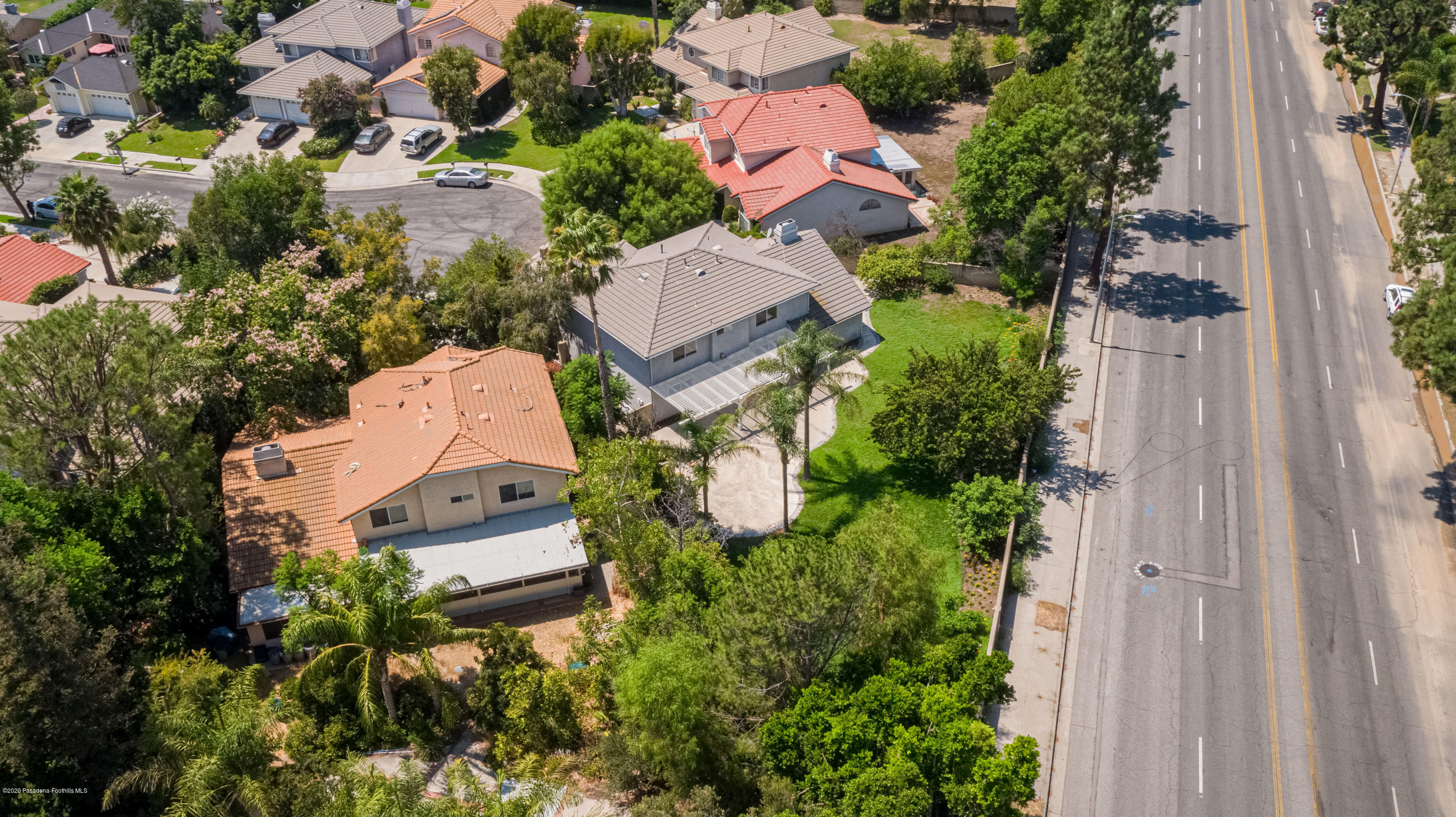 10652 Rathburn Avenue Porter Ranch, CA 91326 - Photo 61 of 61 an aerial view of residential house with outdoor space and parking