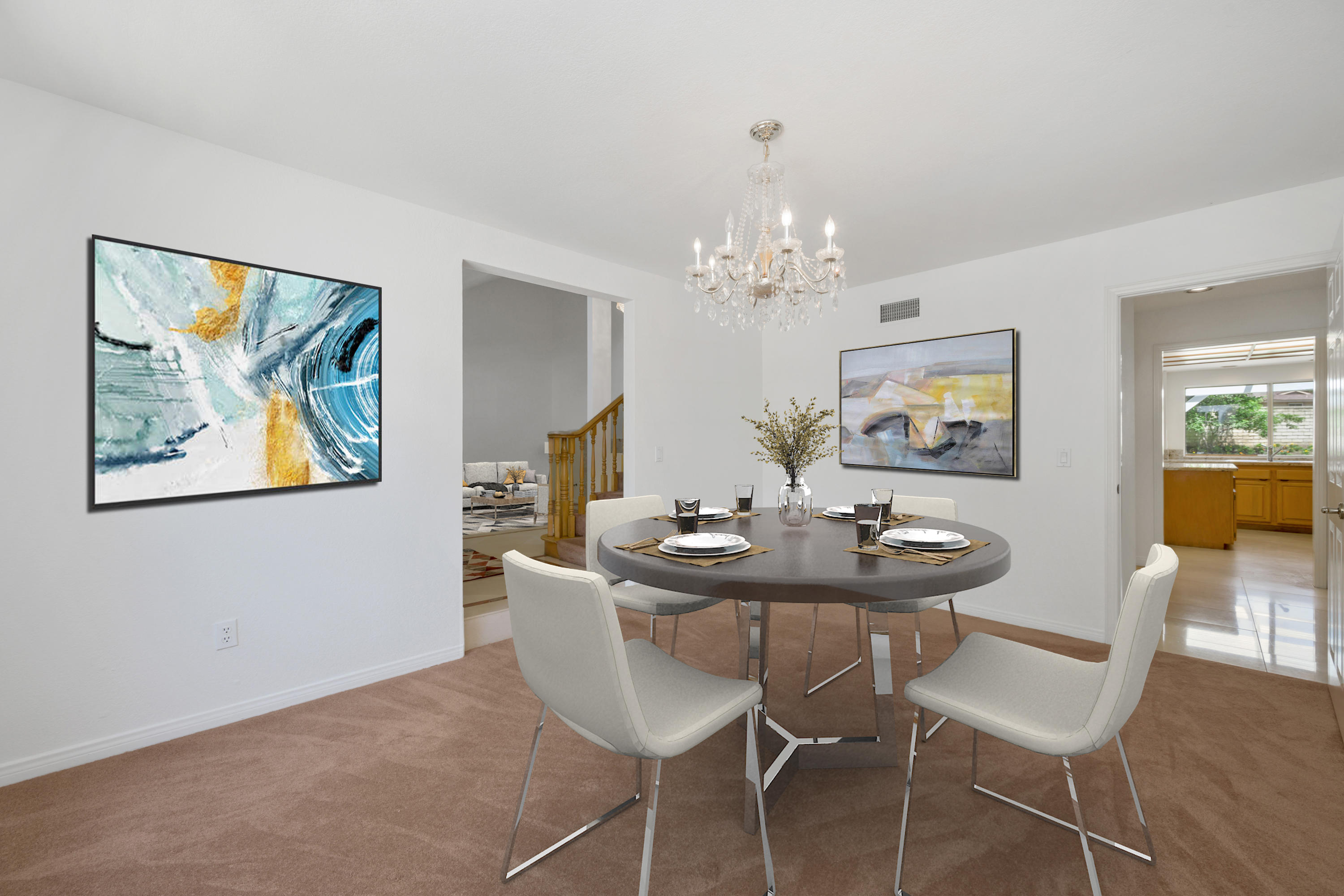 10652 Rathburn Avenue Porter Ranch, CA 91326 - Photo 9 of 61 a dining room with furniture and chandelier