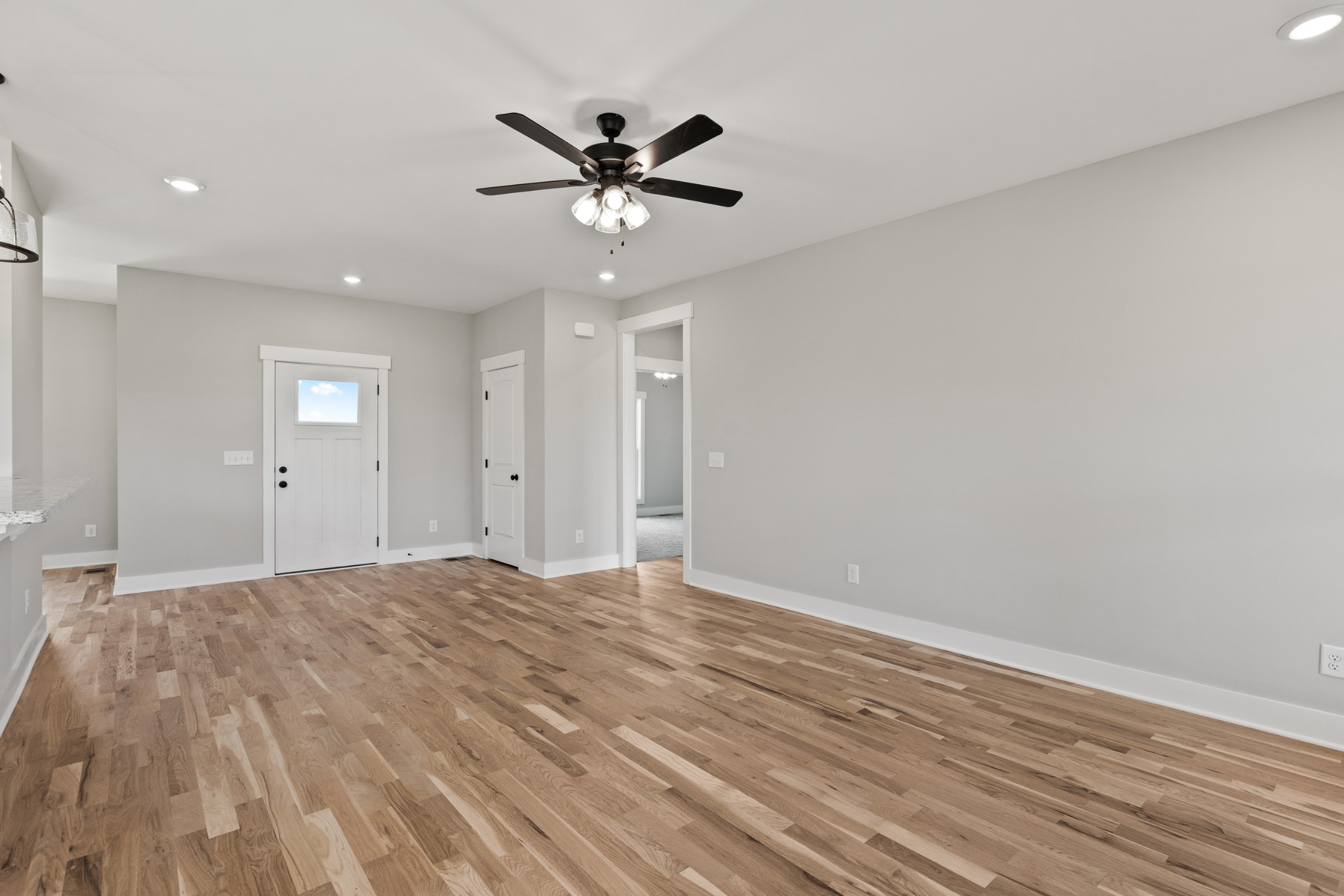 5638 Borthick Road Springfield, TN 37172 - Photo 10 of 43 a view of empty room with wooden floor and fan