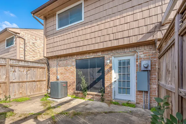 a bathroom with a shower and a mirror
