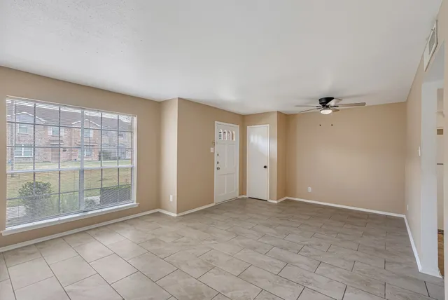 an empty room with windows