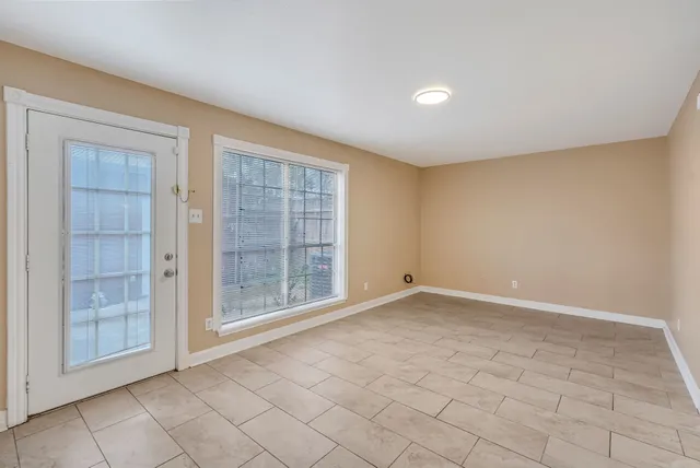 an empty room with windows