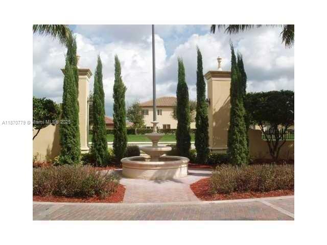 1555 Northeast 33rd Road, Unit 1042 Homestead, FL 33033 - Photo 14 of 19 a living room with furniture