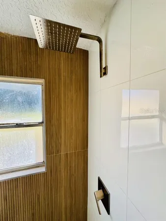 a close view of a shower and a door