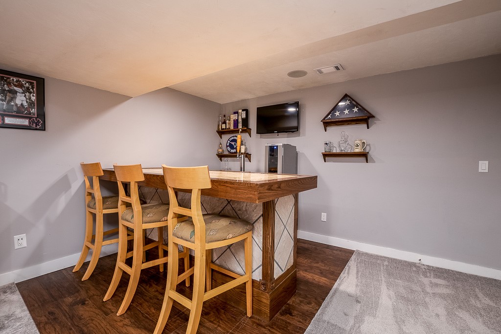 27 Marques Street Cumberland, RI 02864 - Photo 29 of 40 Finished basement w/ bar set up!