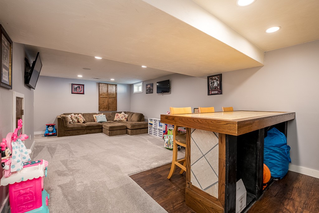 27 Marques Street Cumberland, RI 02864 - Photo 30 of 40 media/family room in finished basement