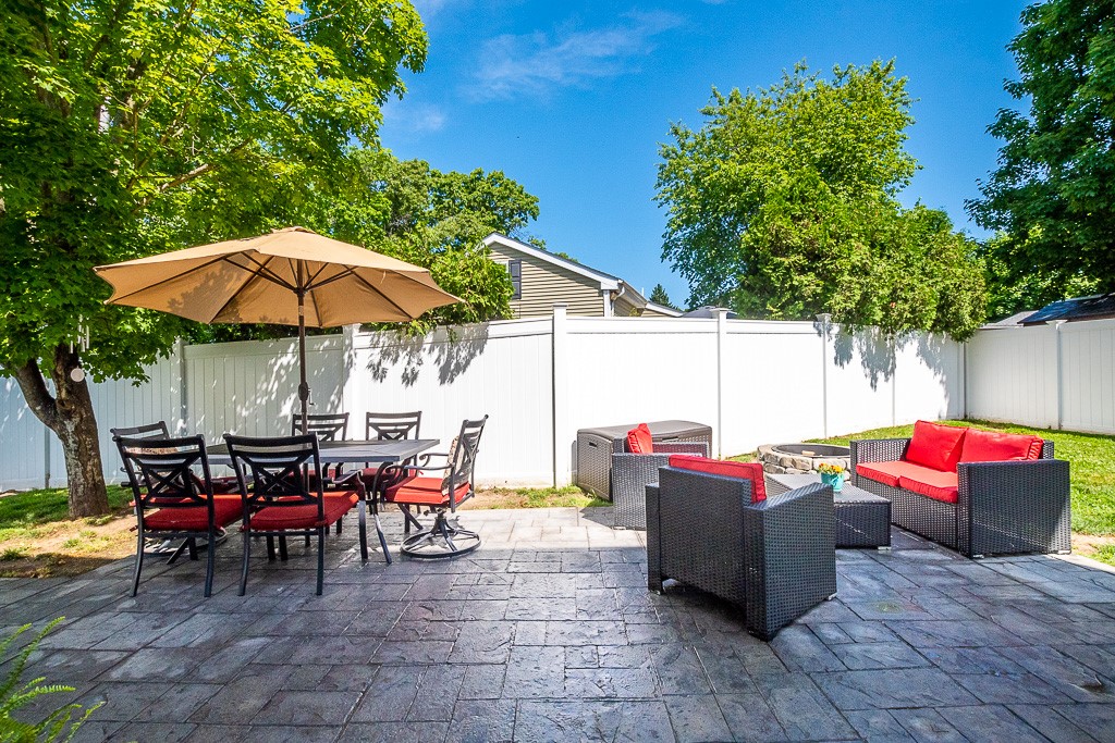 27 Marques Street Cumberland, RI 02864 - Photo 35 of 40 fenced in back yard!