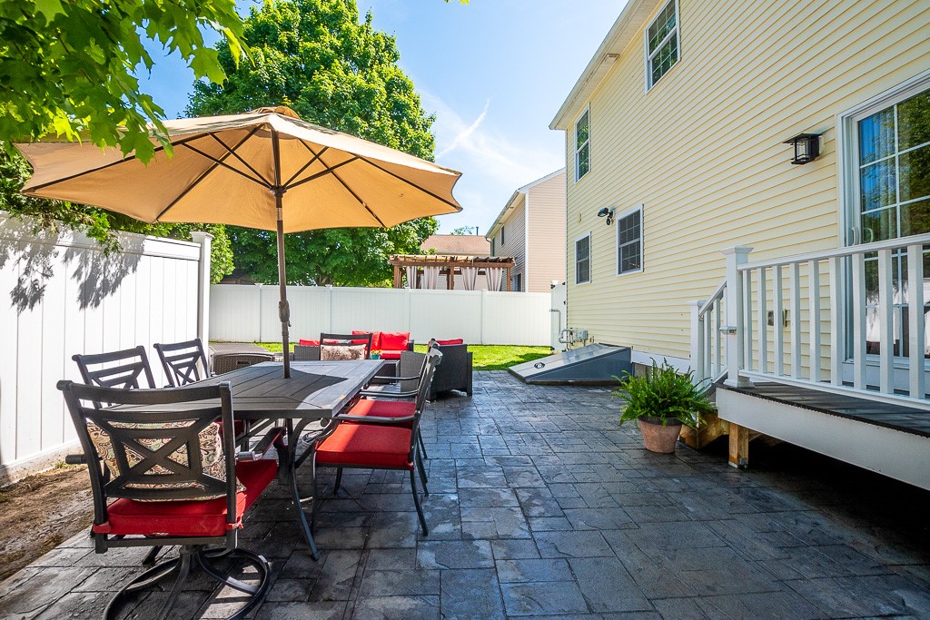27 Marques Street Cumberland, RI 02864 - Photo 38 of 40 Patio area in back yard!