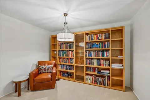 a view of a livingroom with a bookshelf