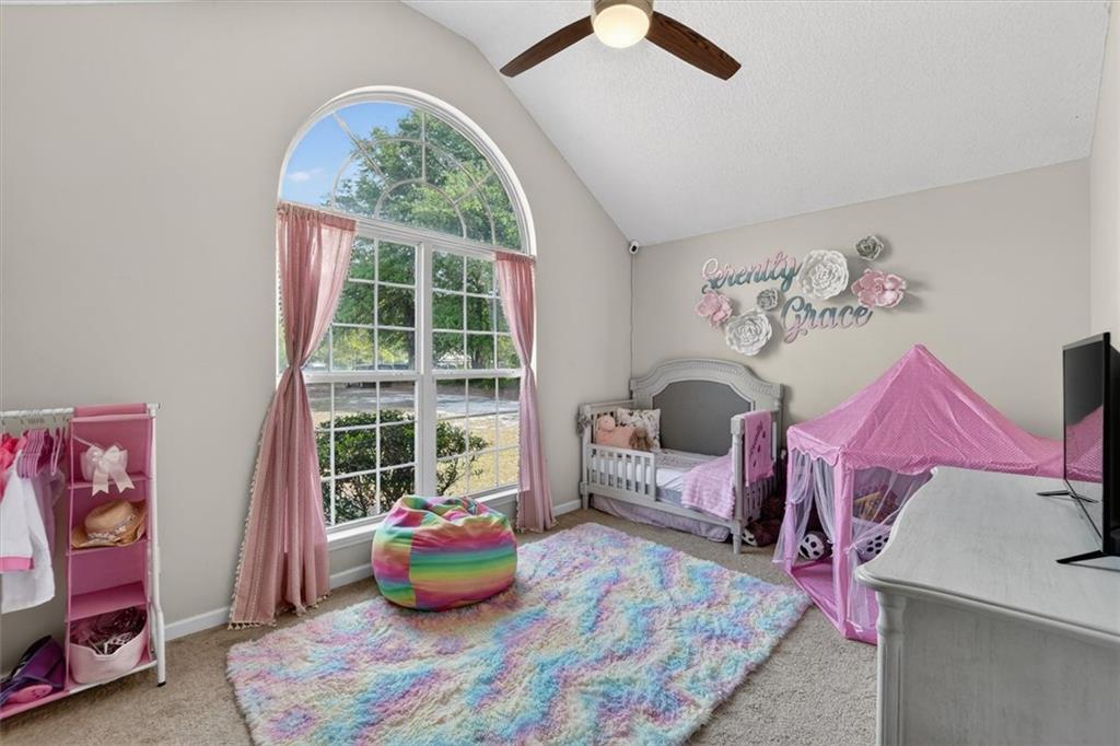 359 Poole Road Ludowici, GA 31316 - Photo 24 of 49 a bedroom with bed and a large window