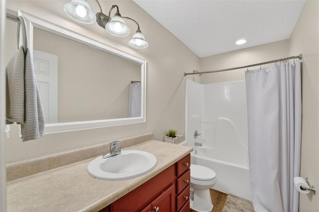 359 Poole Road Ludowici, GA 31316 - Photo 35 of 49 a bathroom with a granite countertop sink toilet and a mirror