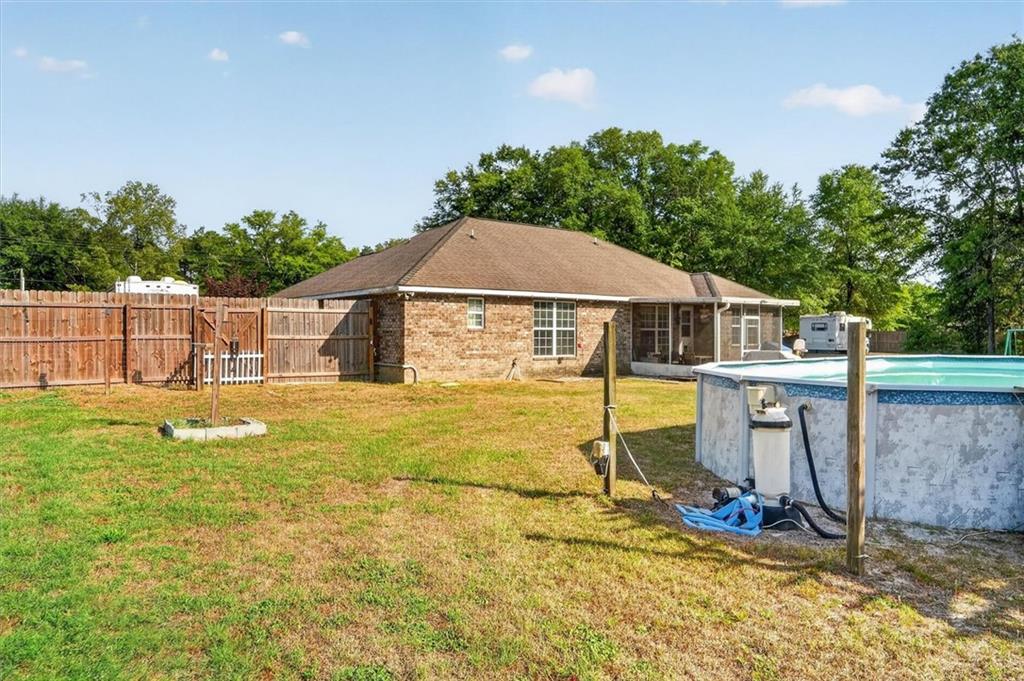 359 Poole Road Ludowici, GA 31316 - Photo 39 of 49 a house view with a garden space