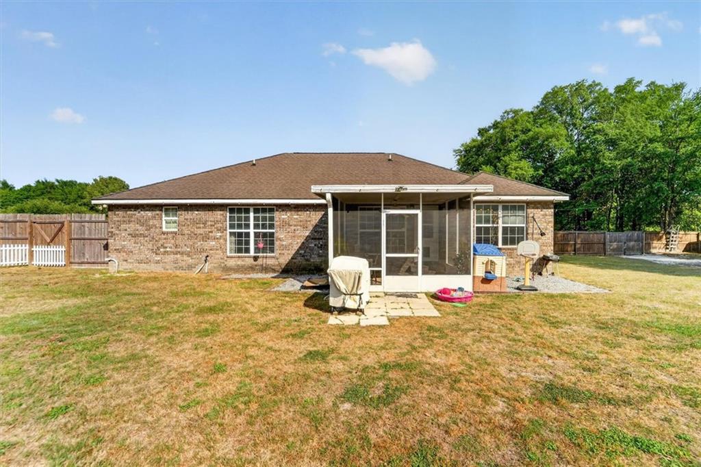 359 Poole Road Ludowici, GA 31316 - Photo 40 of 49 a front view of a house with swimming pool and porch