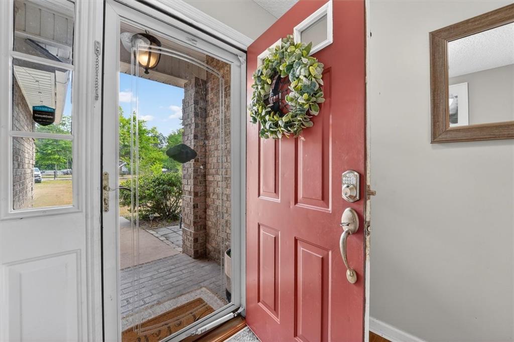 359 Poole Road Ludowici, GA 31316 - Photo 6 of 49 a view of a door and chair in front of a house