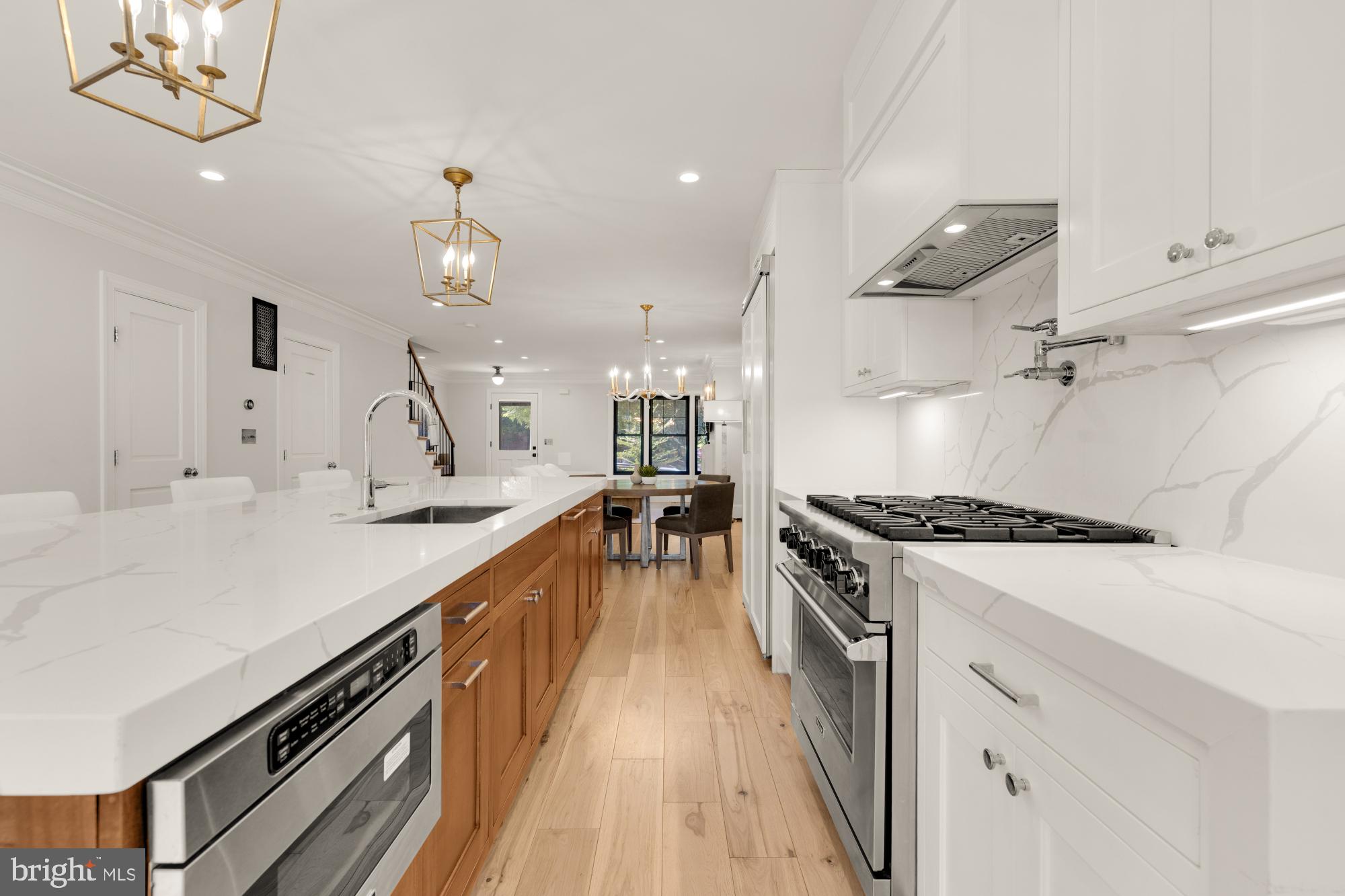 3705 Reservoir Road Northwest Washington, DC 20007 - Photo 16 of 45 a kitchen with stove and cabinets