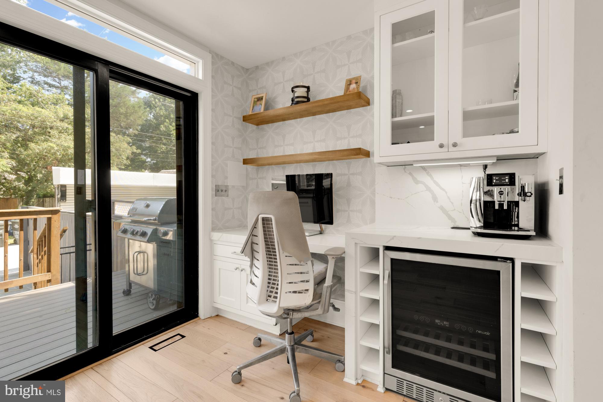 3705 Reservoir Road Northwest Washington, DC 20007 - Photo 21 of 45 a living room with a fireplace windows and a flat screen tv