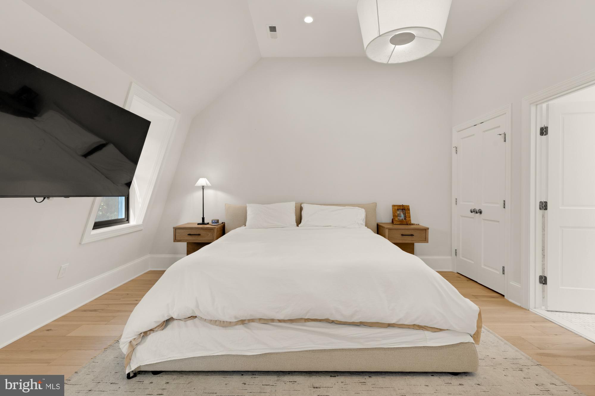 3705 Reservoir Road Northwest Washington, DC 20007 - Photo 26 of 45 a large white bed in a white room