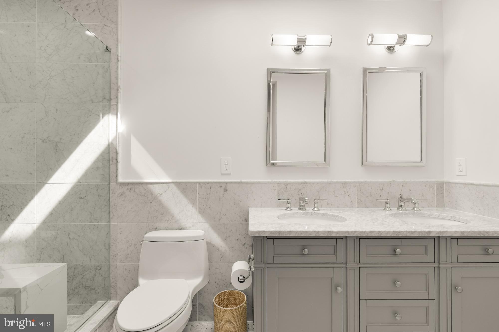 3705 Reservoir Road Northwest Washington, DC 20007 - Photo 28 of 45 a bathroom with a sink vanity granite and toilet