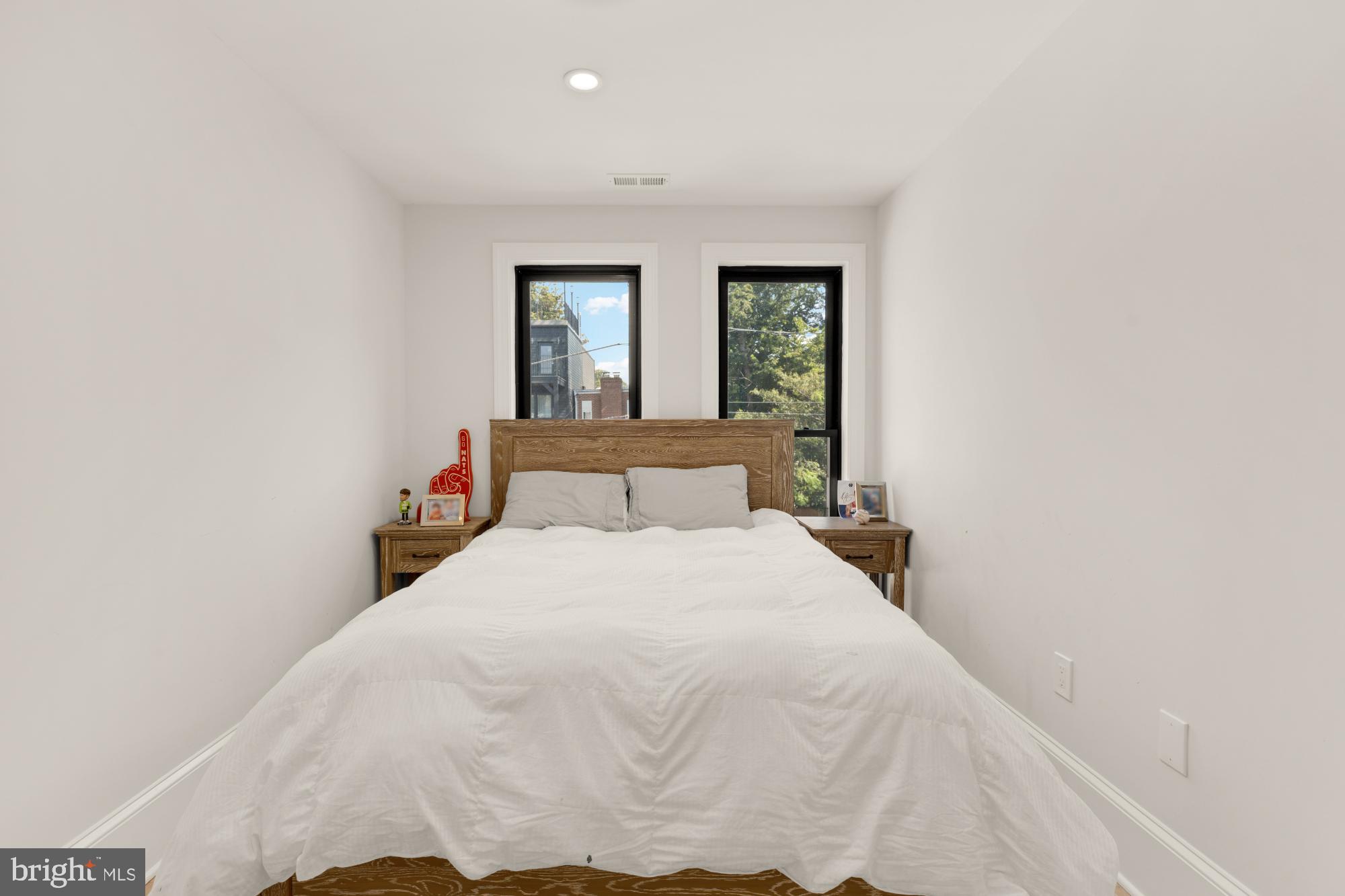 3705 Reservoir Road Northwest Washington, DC 20007 - Photo 30 of 45 a bedroom with a bed and window