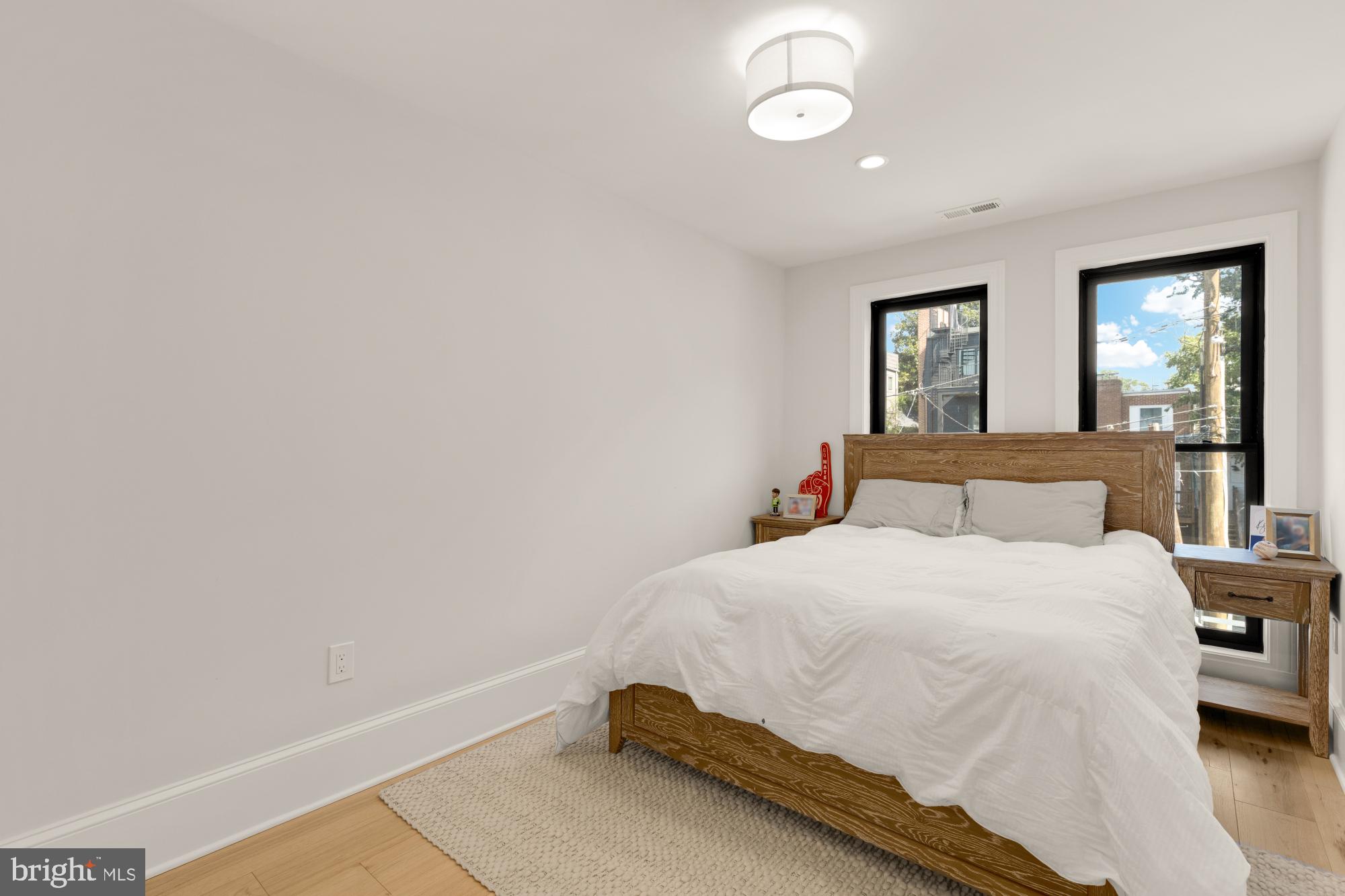 3705 Reservoir Road Northwest Washington, DC 20007 - Photo 31 of 45 a bedroom with a bed and window