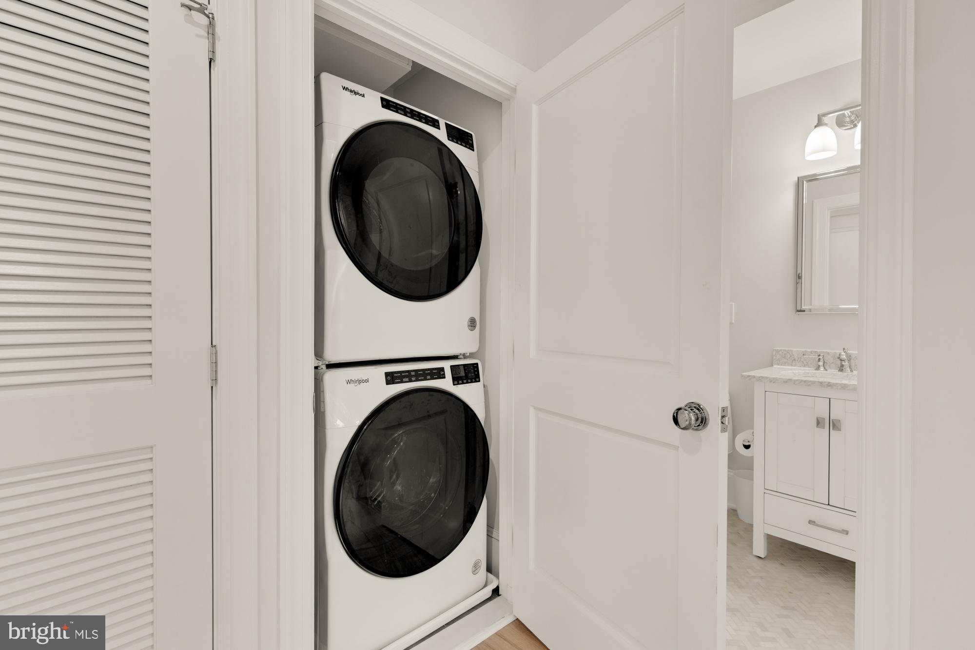 3705 Reservoir Road Northwest Washington, DC 20007 - Photo 33 of 45 a view of a hallway with washer and dryer