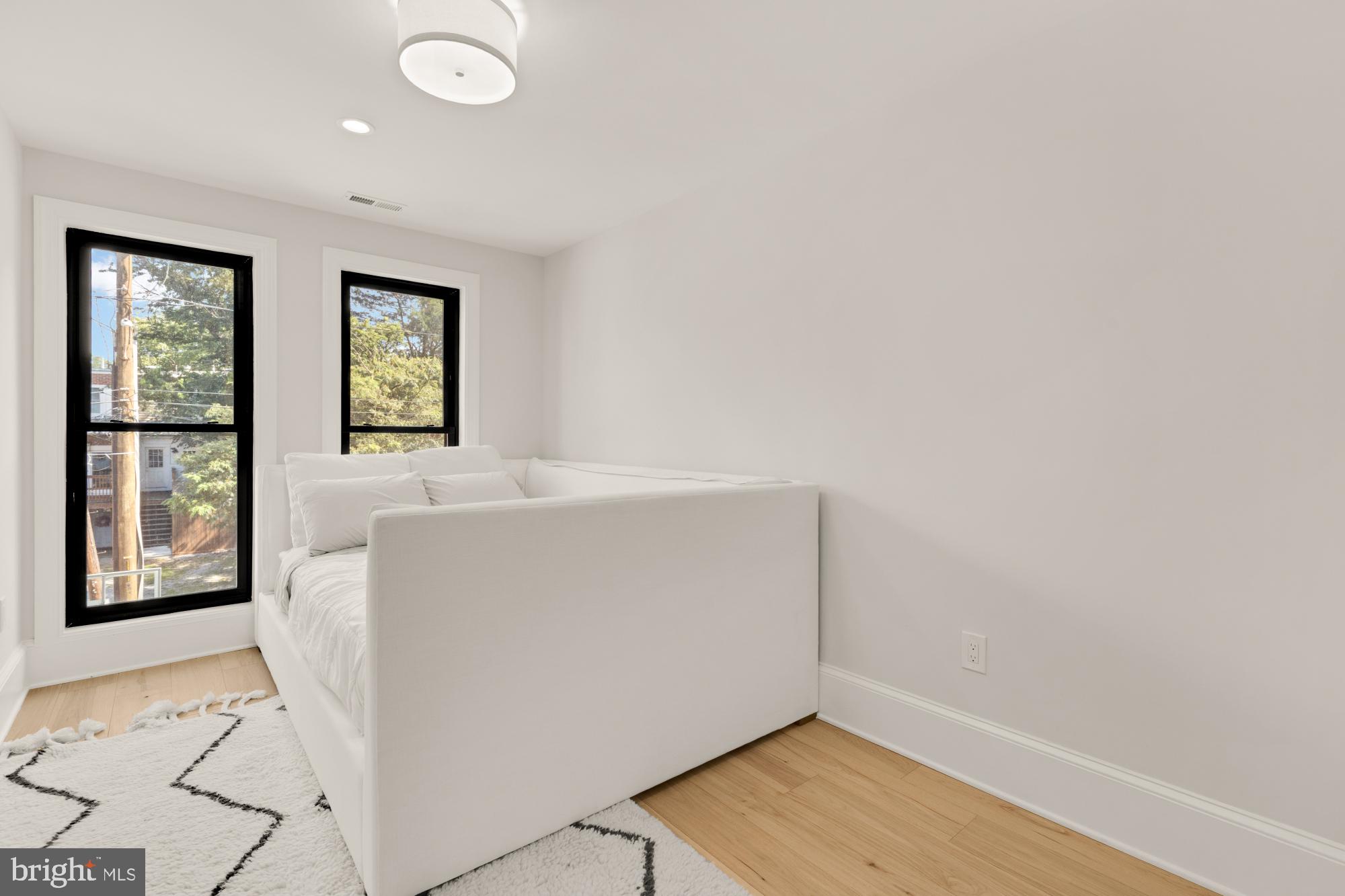 3705 Reservoir Road Northwest Washington, DC 20007 - Photo 36 of 45 an entryway with wooden floor and windows