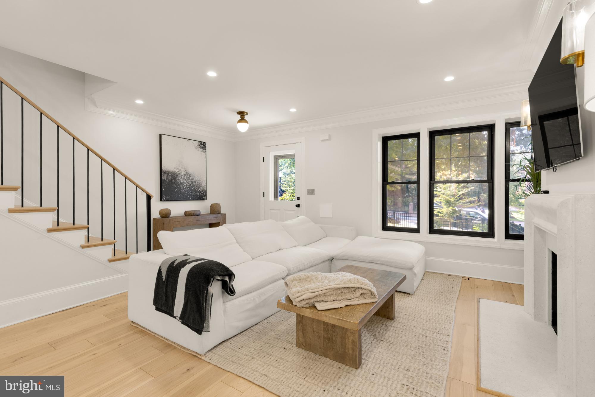 3705 Reservoir Road Northwest Washington, DC 20007 - Photo 4 of 45 a living room with furniture and a flat screen tv
