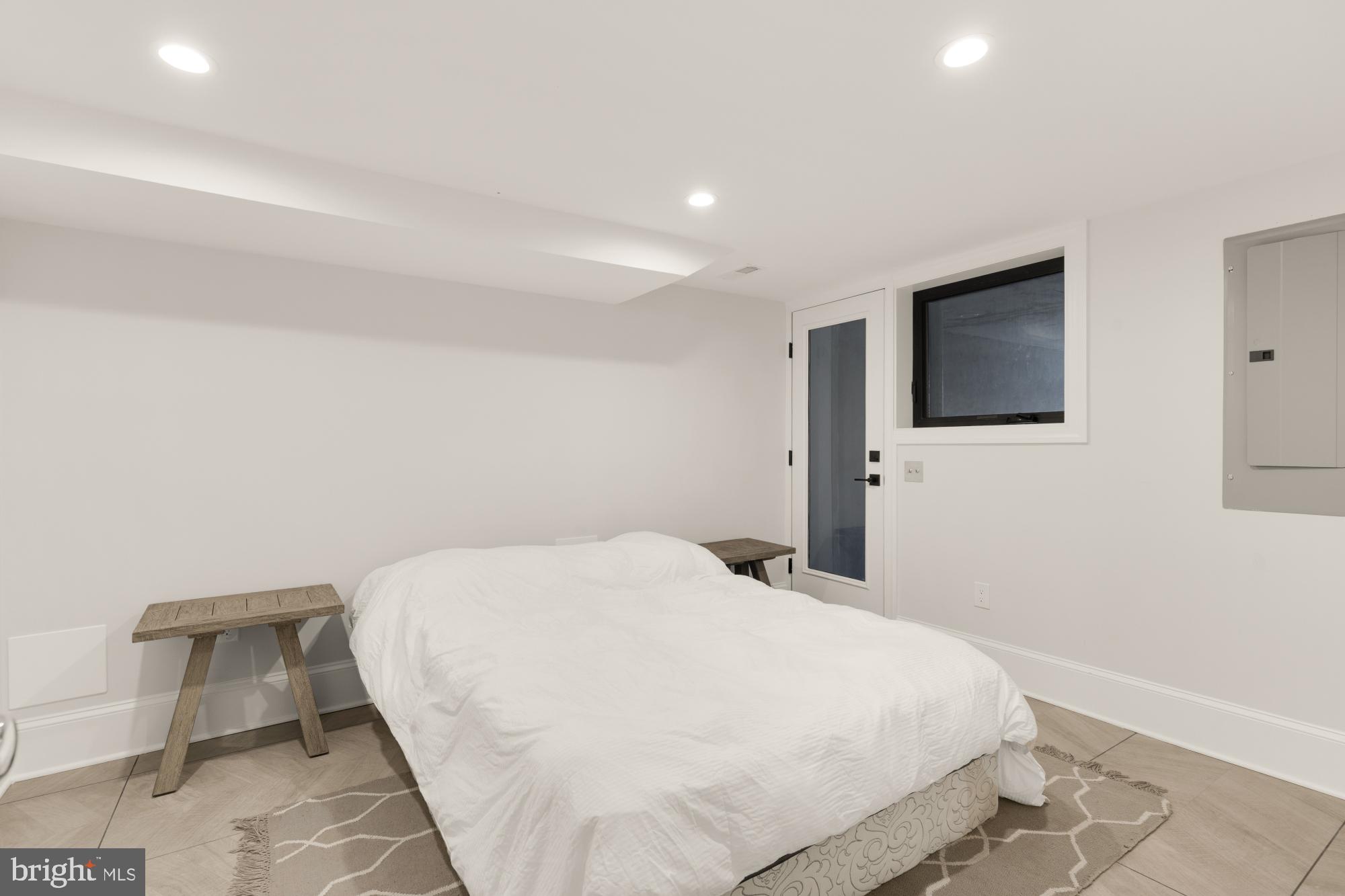 3705 Reservoir Road Northwest Washington, DC 20007 - Photo 43 of 45 a large white bed in a white room