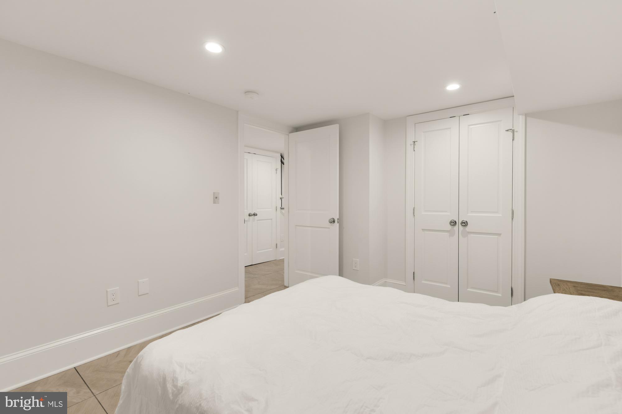 3705 Reservoir Road Northwest Washington, DC 20007 - Photo 44 of 45 a bedroom with a bed and a cabinet