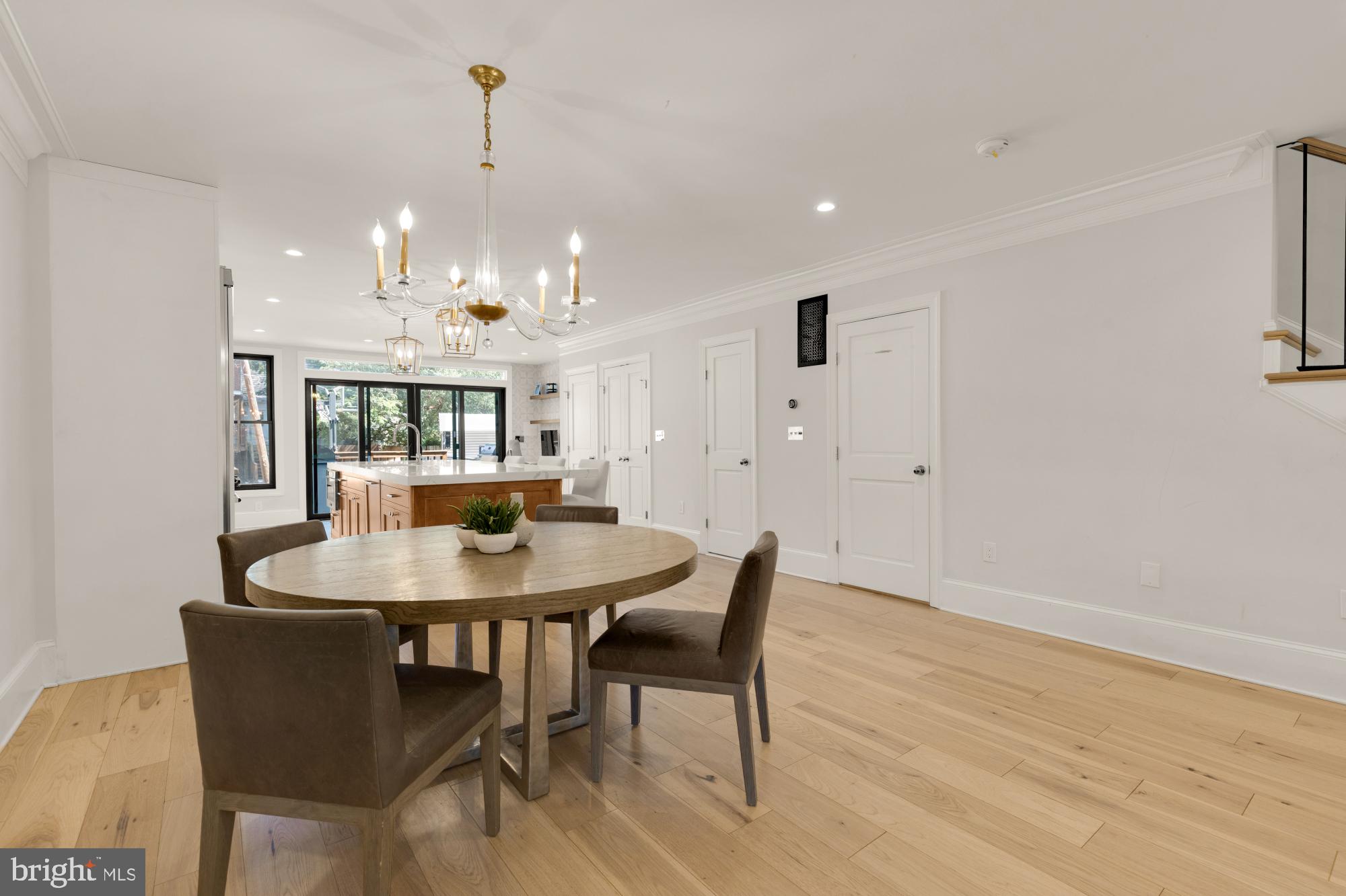 3705 Reservoir Road Northwest Washington, DC 20007 - Photo 9 of 45 a view of a dining room with furniture and chandelier