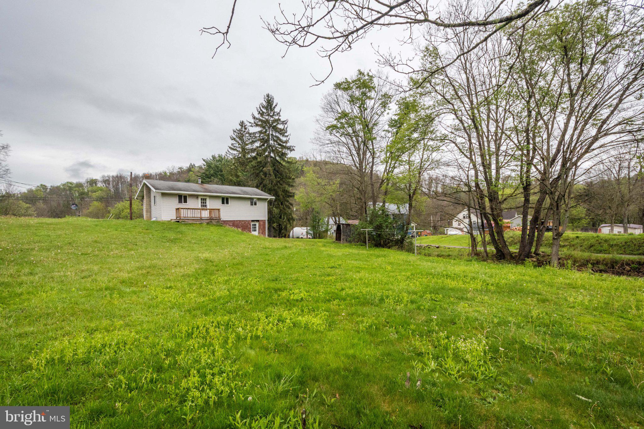 2155 Jennings Road Grantsville, MD 21536 - Photo 8 of 39 Serene home on lush green landscape.