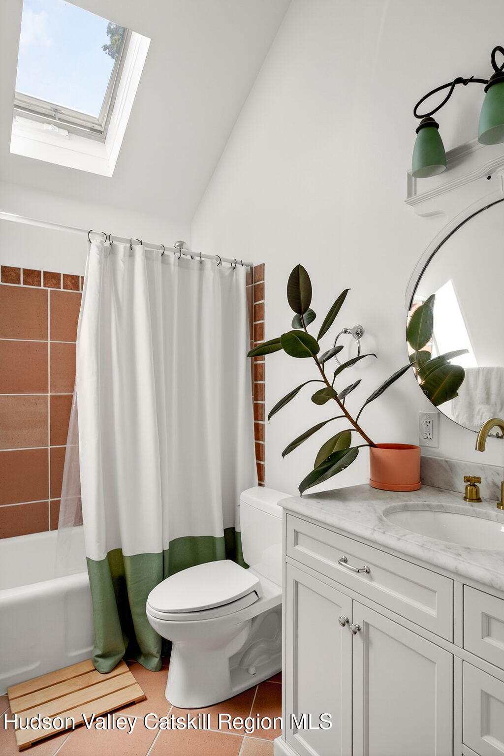 31 Church Street Red Hook, NY 12571 - Photo 15 of 20 a bathroom with a sink a toilet and shower