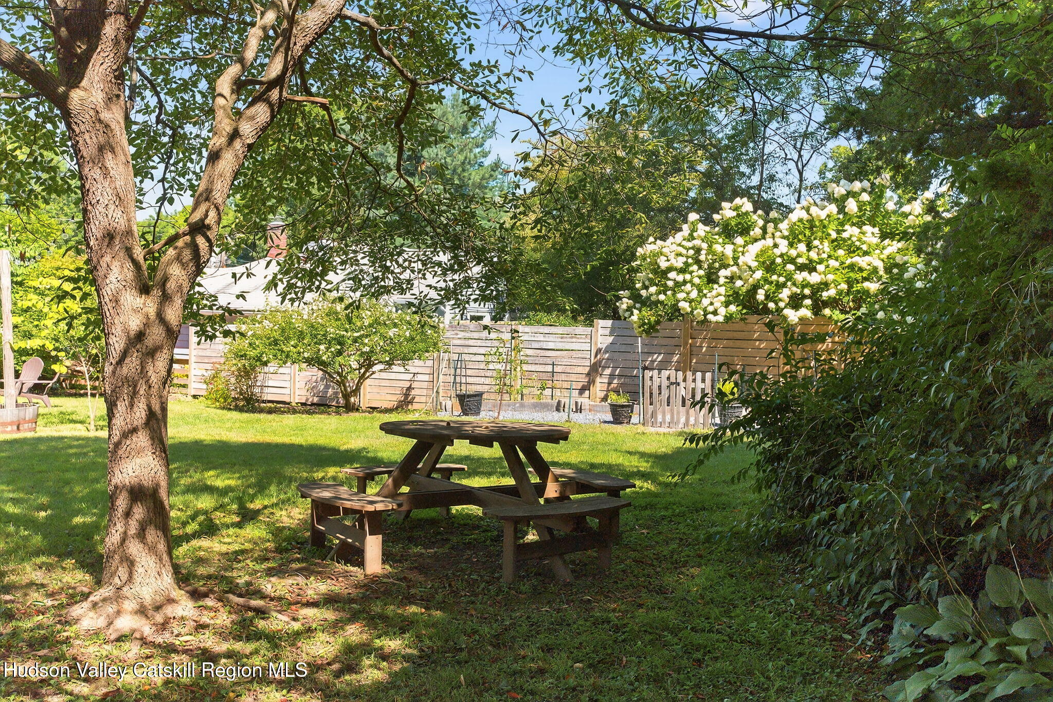 31 Church Street Red Hook, NY 12571 - Photo 20 of 20 a view of a garden with lawn chairs