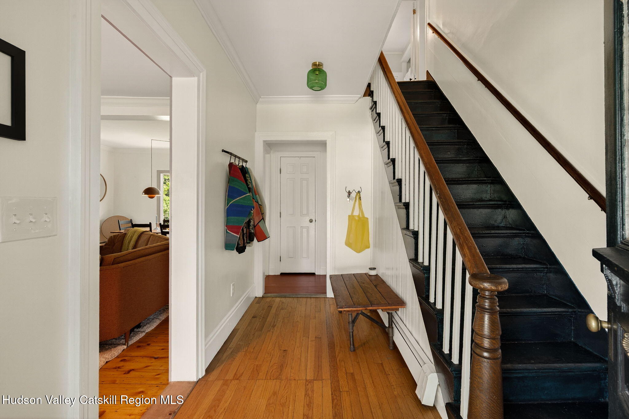 31 Church Street Red Hook, NY 12571 - Photo 3 of 20 a view of a hallway with wooden floor and staircase