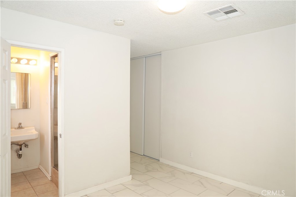 38626 Frontier Avenue Palmdale, CA 93550 - Photo 7 of 13 a view of a bathroom with a sink