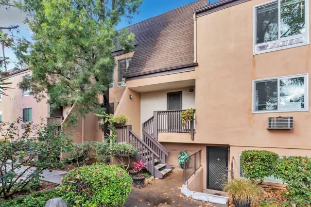 a view of houses with an outdoor space