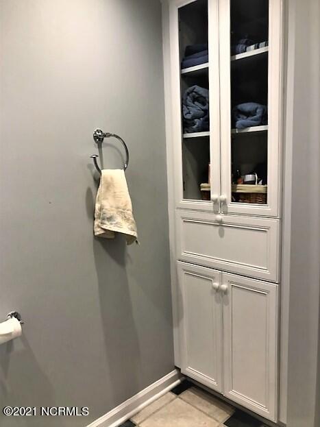 1725 Kings Landing Road Hampstead, NC 28443 - Photo 27 of 48 Guest Bath Linen Closet