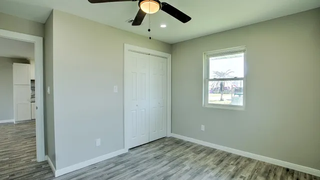 a view of an empty room and window
