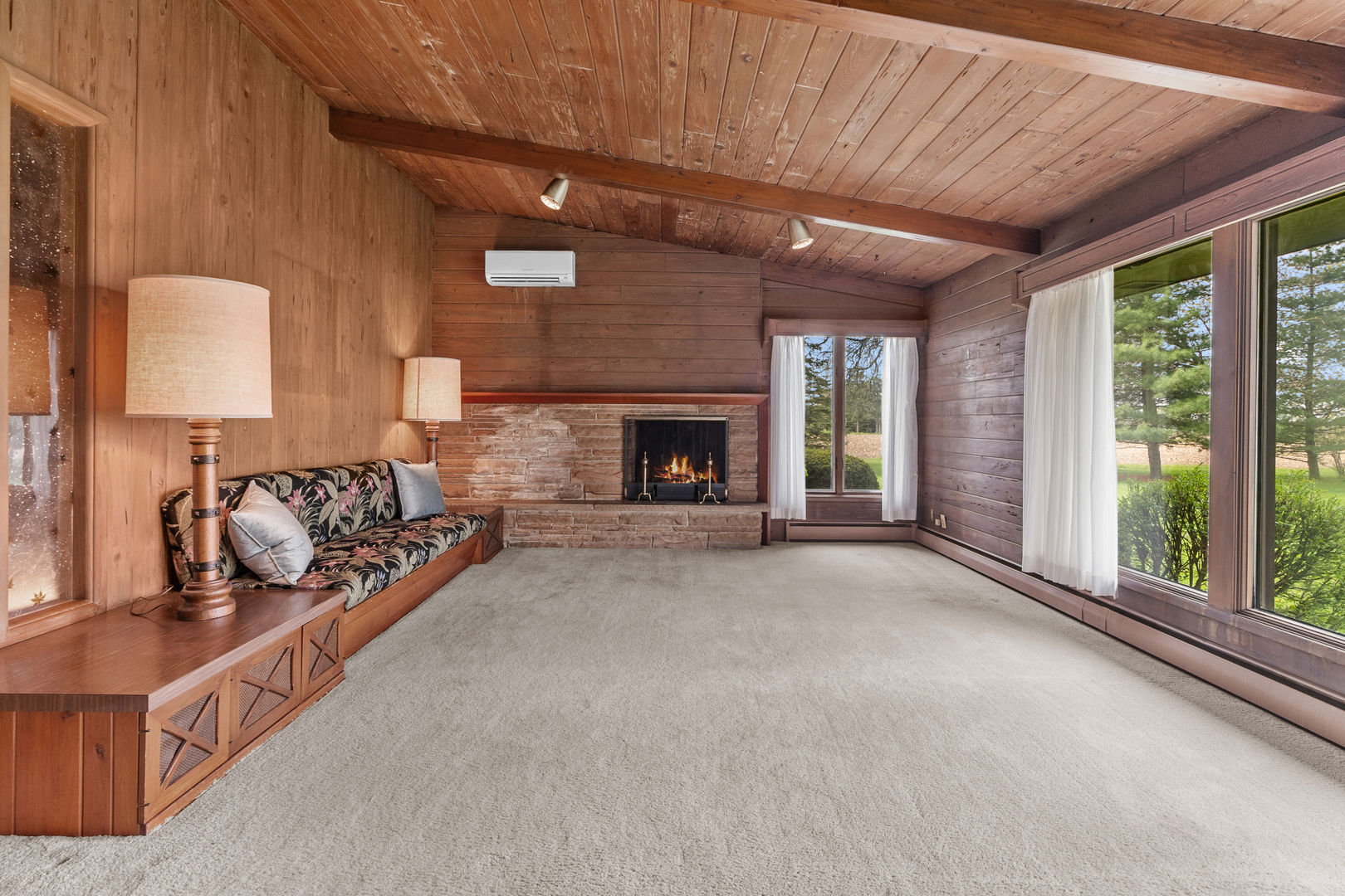 6907 White Oaks Road Harvard, IL 60033 - Photo 5 of 21 a living room with furniture and a fireplace