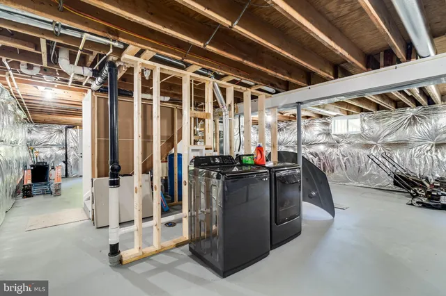 a view of a garage with a table and chairs