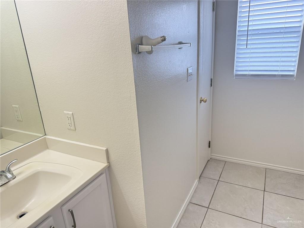 3414 Santa Rocio Mission, TX 78572 - Photo 11 of 19 a bathroom with a sink and vanity