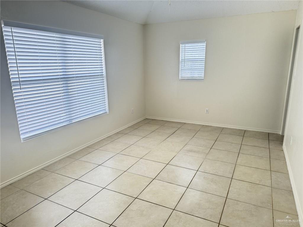 3414 Santa Rocio Mission, TX 78572 - Photo 14 of 19 an empty room with a white cabinet door