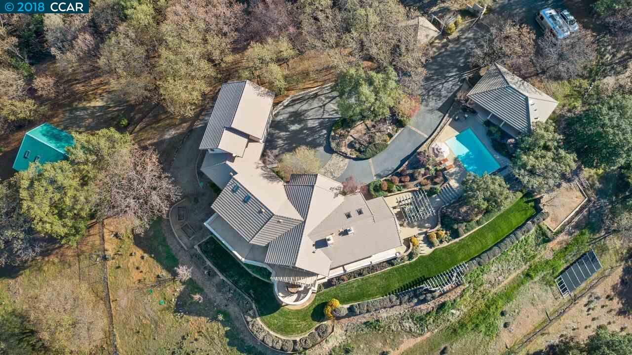 300 Eagle Drive Murphys, CA 95247 - Photo 1 of 40 an aerial view of a house with a yard and garden