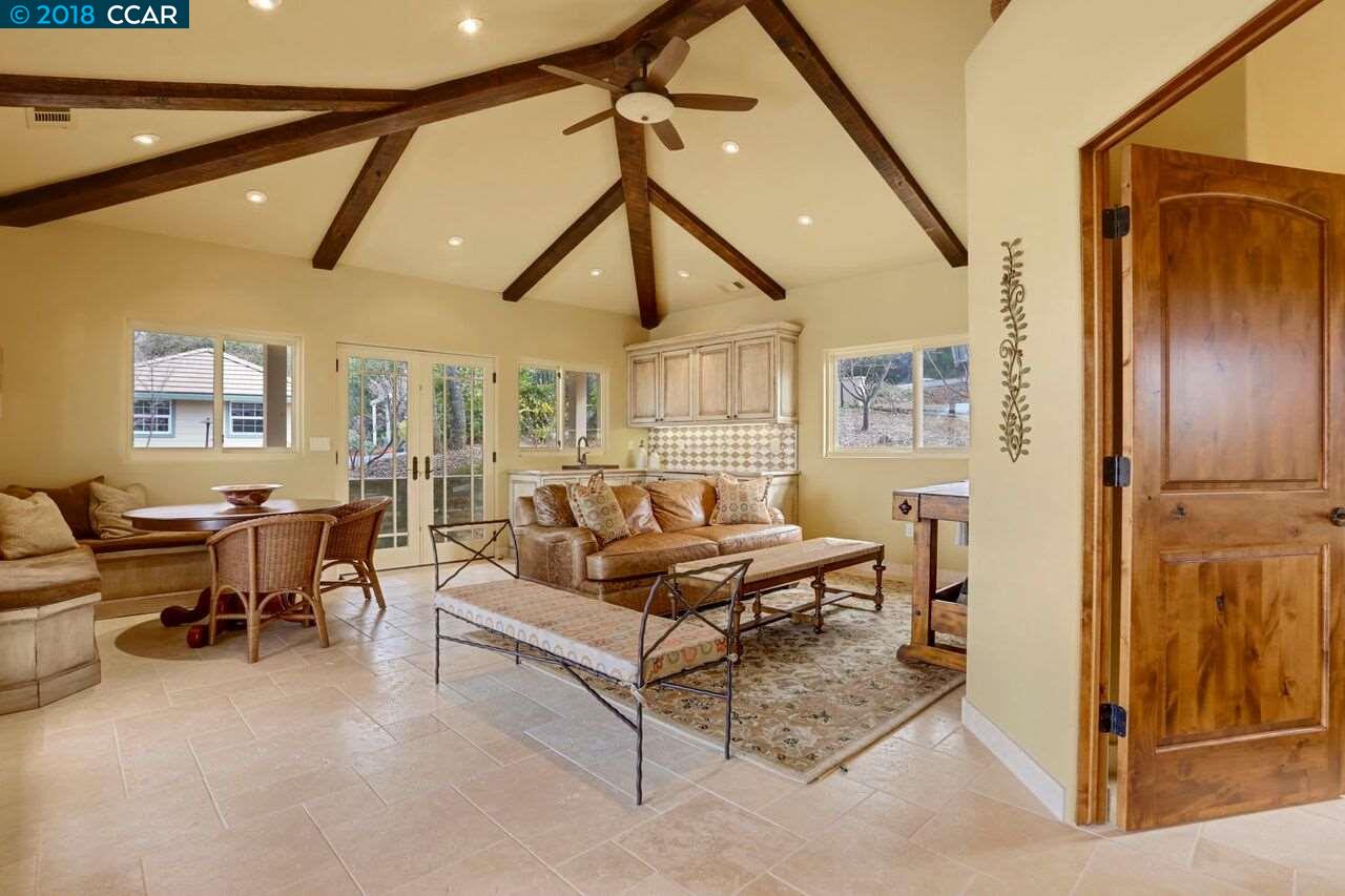 300 Eagle Drive Murphys, CA 95247 - Photo 12 of 40 a living room with furniture and a window