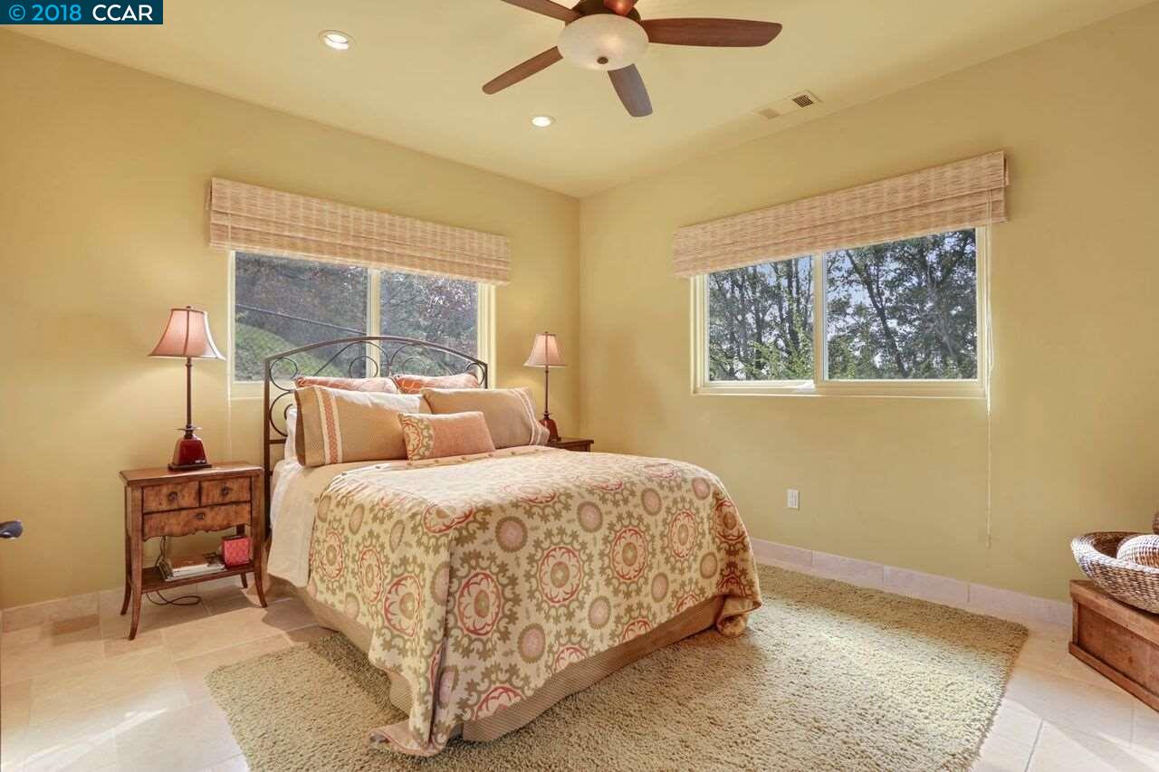 300 Eagle Drive Murphys, CA 95247 - Photo 14 of 40 a bedroom with a bed and window