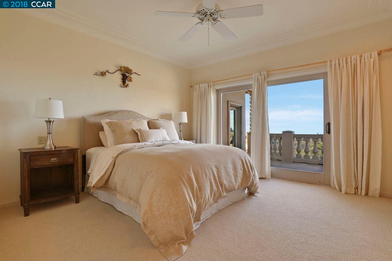 300 Eagle Drive Murphys, CA 95247 - Photo 24 of 40 a bedroom with a bed and a night stand