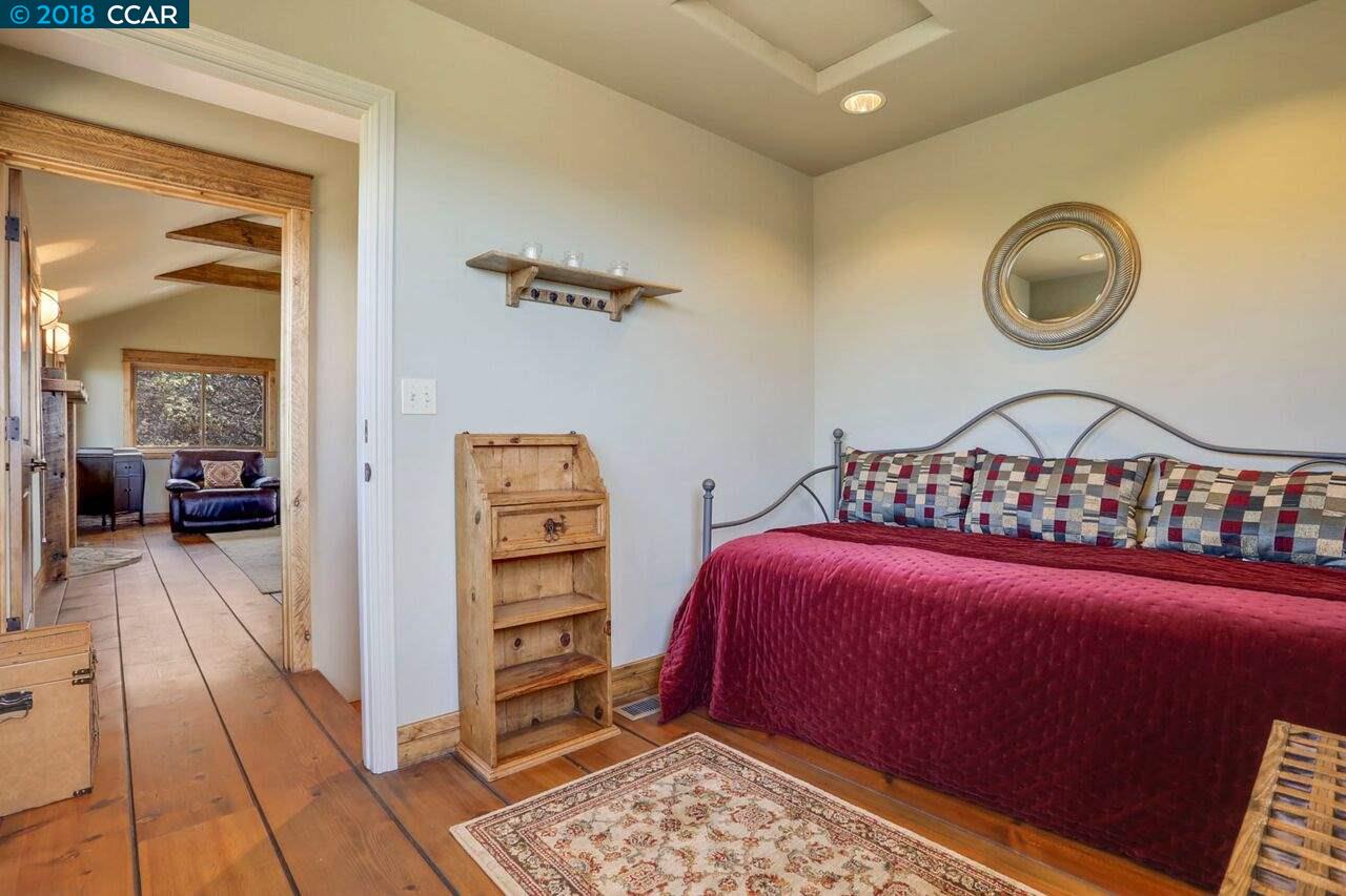 300 Eagle Drive Murphys, CA 95247 - Photo 31 of 40 a bedroom with a bed and dresser